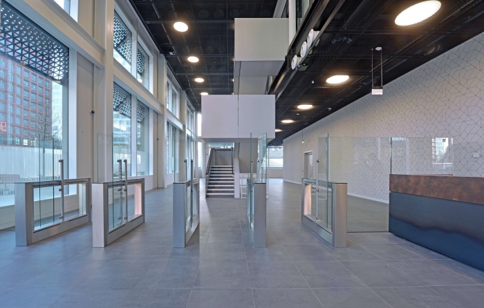 The reception desk and entrance gates of the new First Street Hub in Manchester Photo: Ask Real Estate